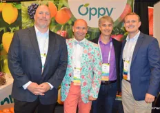 In a flowerful outfit, Gabe Romero with Mann Packing joins Brett Libke, Chris Ford and Jim Leach in Oppy's booth.